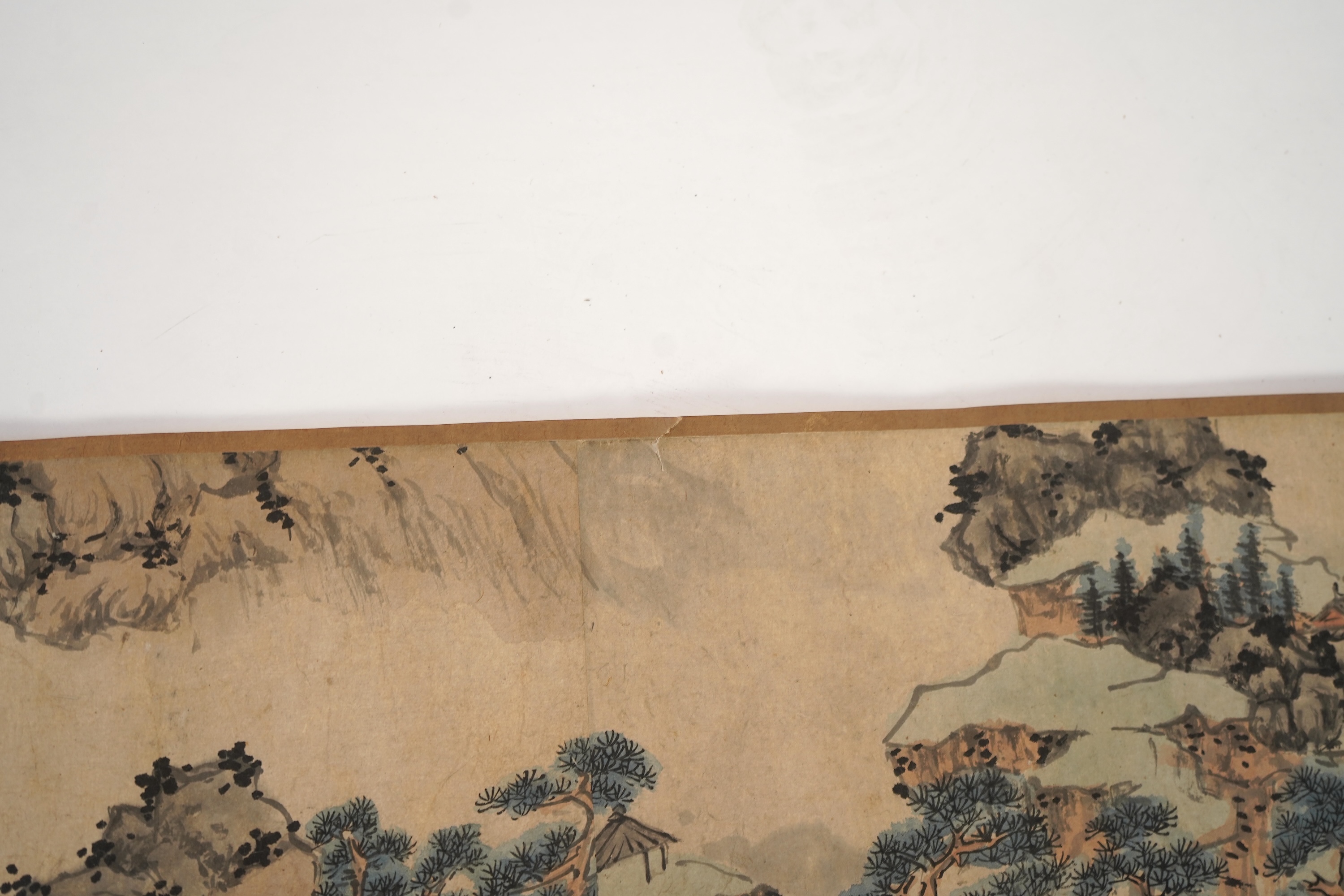 Chinese School , (Qing dynasty), Figures in a mountainous river landscape, Ink and colour on paper handscroll, 268.5cm x 29cm excluding borders